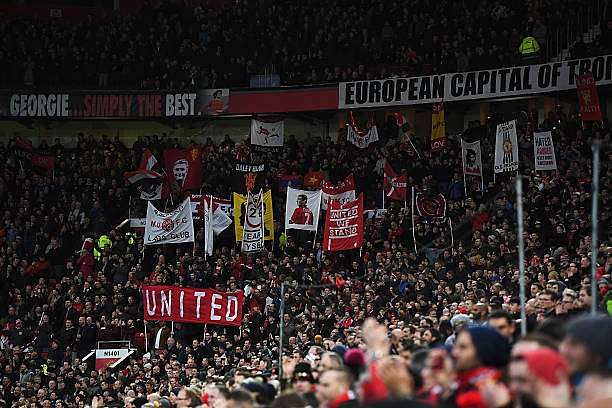 MANCHESTER, ENGLAND - JANUARY 15: Man Utd fans show their support prior to the Premier League match between Manchester United and Liverpool at Old Trafford on January 15, 2017 in Manchester, England. (Photo by Laurence Griffiths/Getty Images)